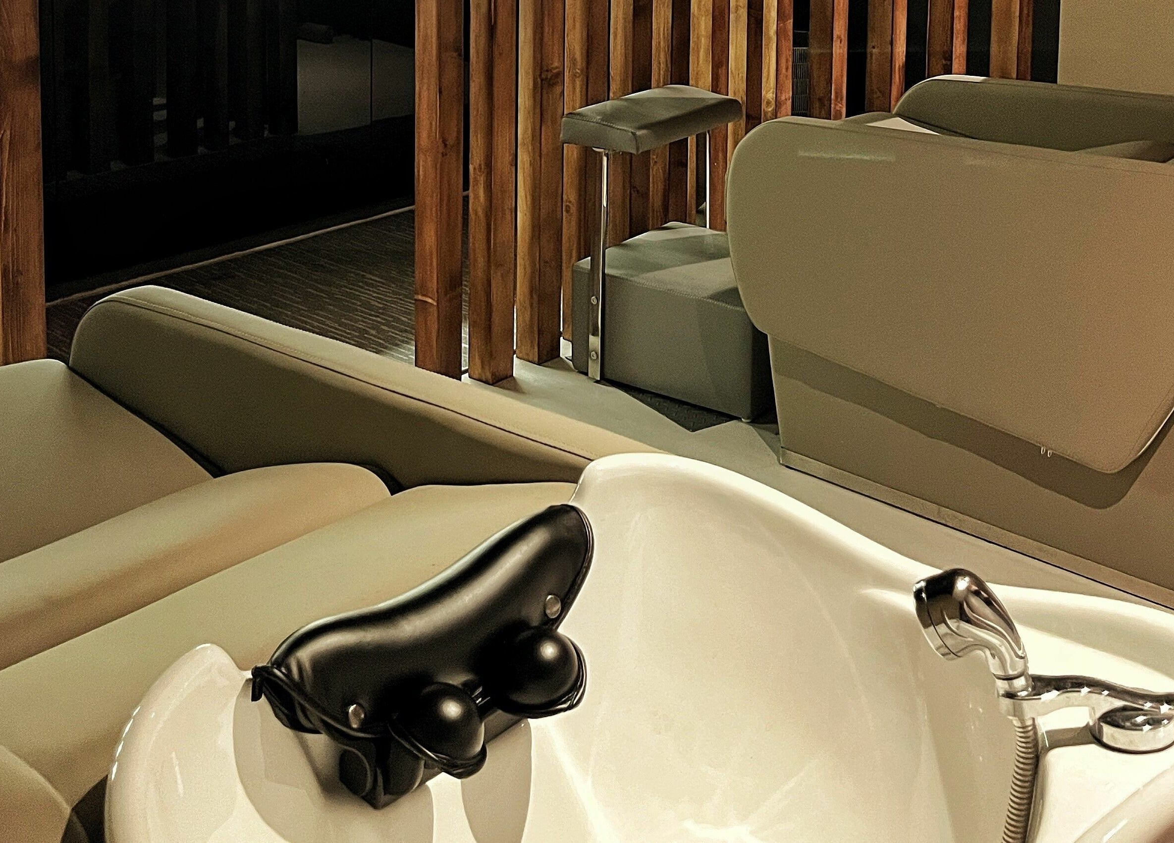 Luxurious washchair area at Roots, 香港島, 香港島, HK, offering comfort and style.