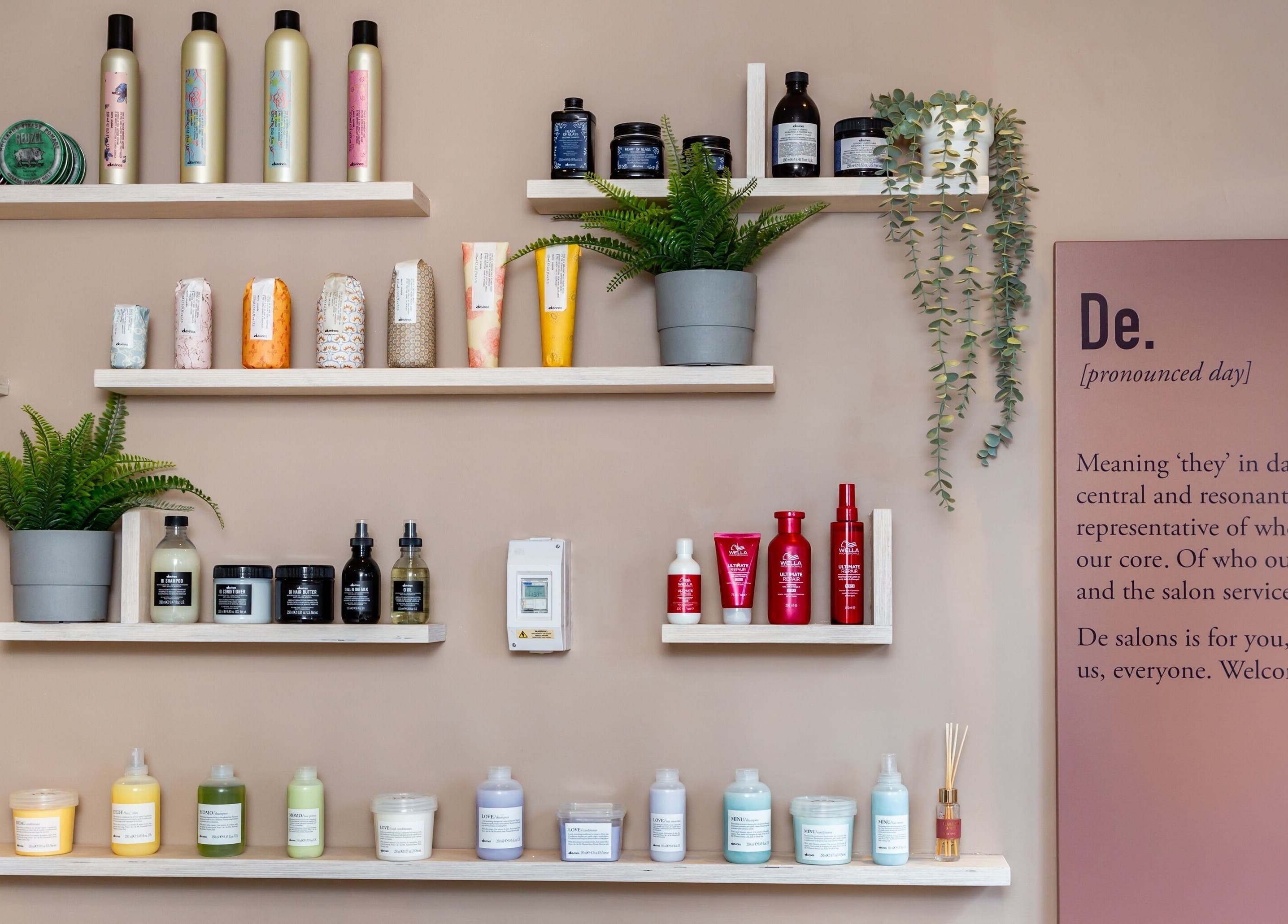 Shelf display of beauty products at De.Salons Peckham in London, England, GB with elegant decor.