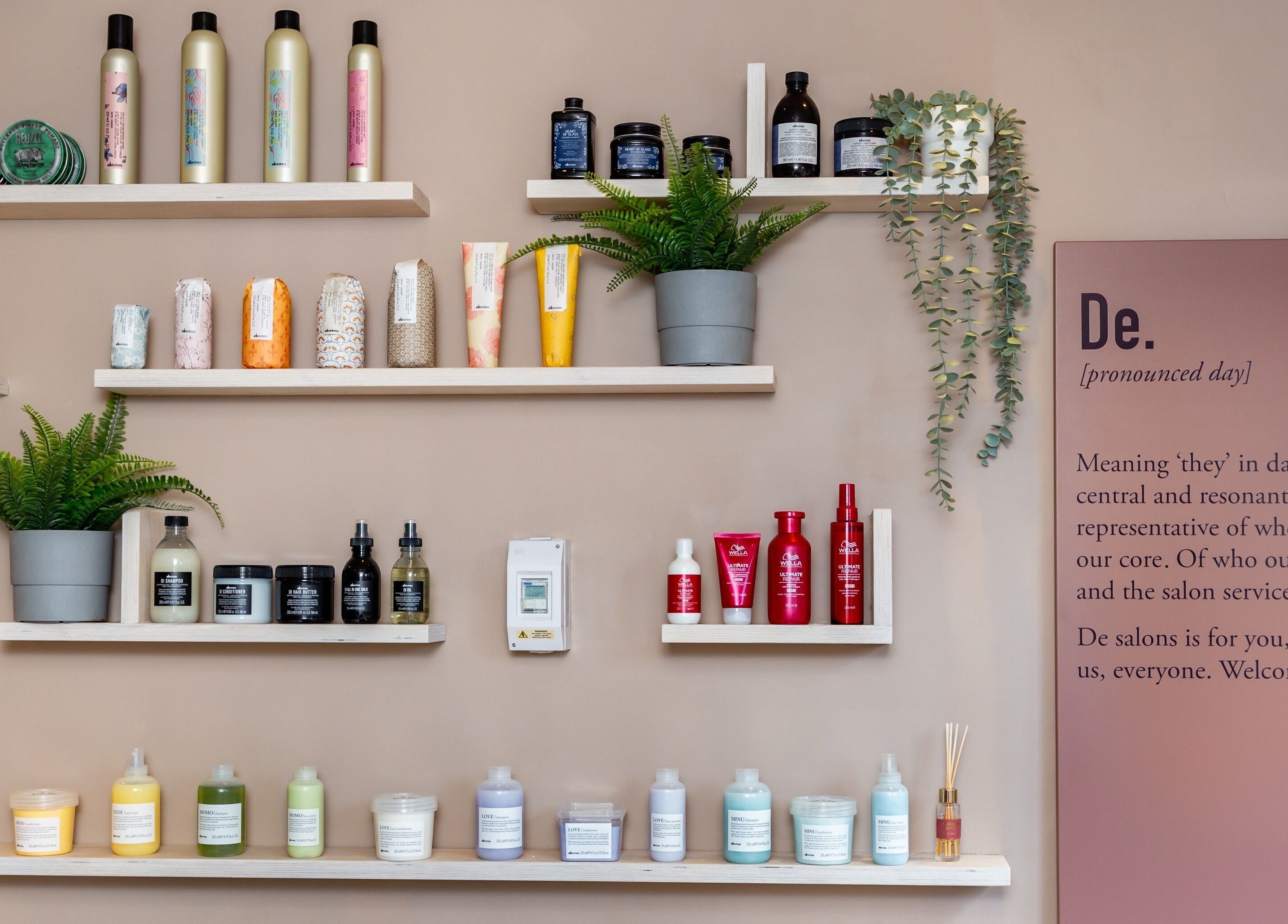 Shelf display of beauty products at De.Salons Peckham in London, England, GB with elegant decor.