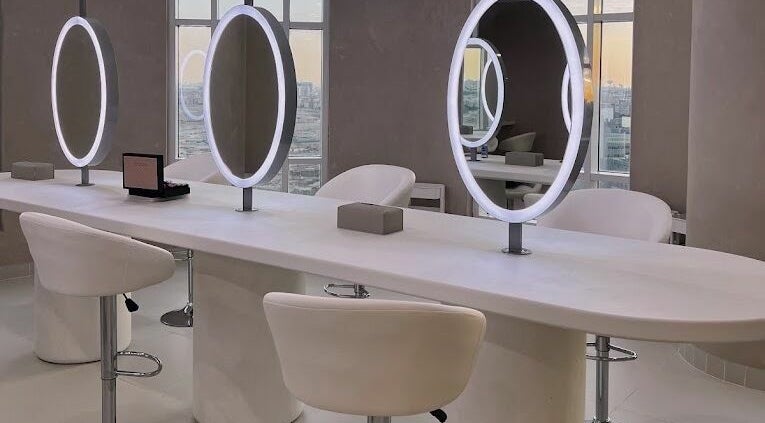 Modern makeup stations at The Hair And Makeup Factory in Dubai, Dubai, AE offer sleek design and comfort.