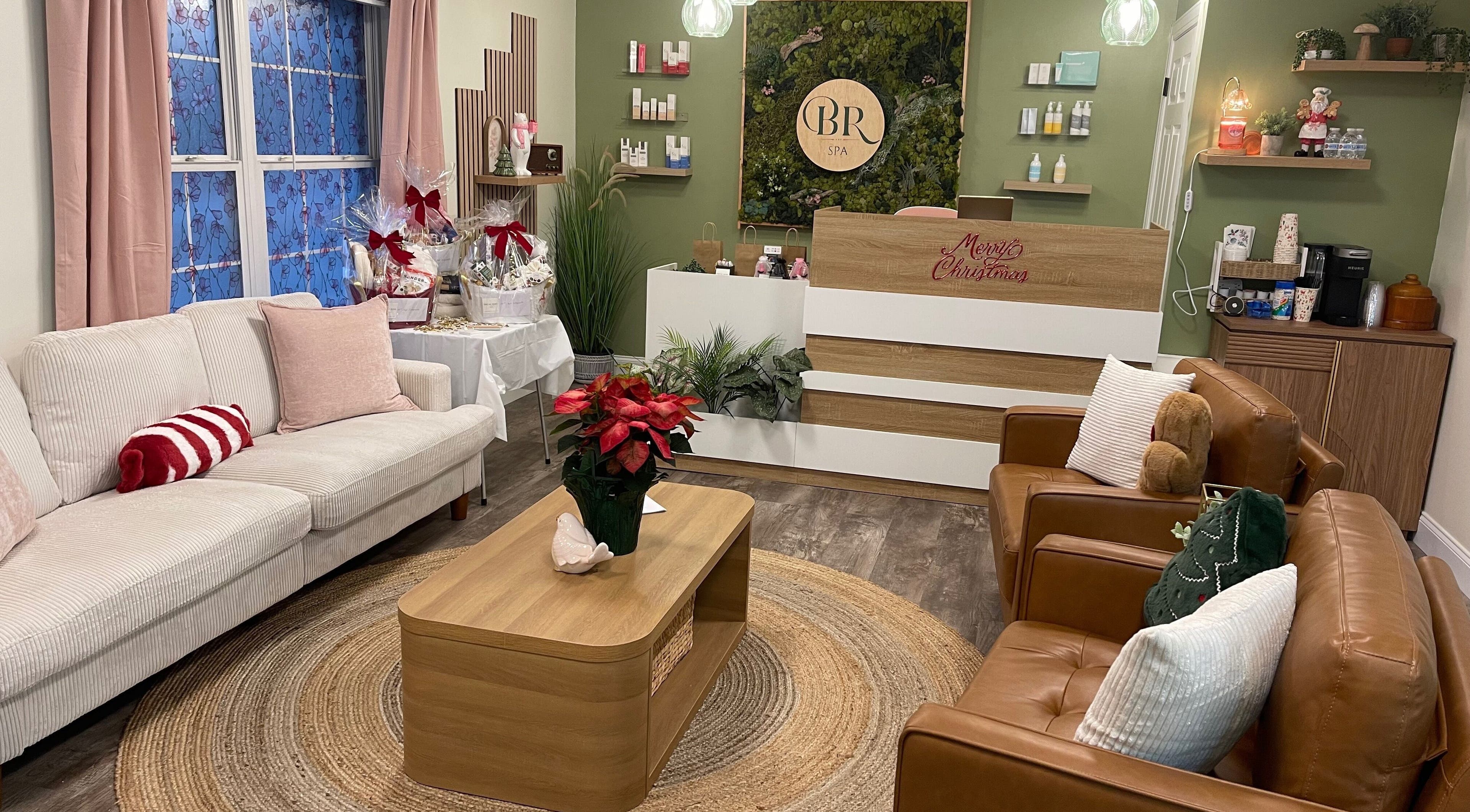 Cozy lounge area at Briar Rose Spa, Sevierville, Tennessee, US, with festive decor and comfortable seating.