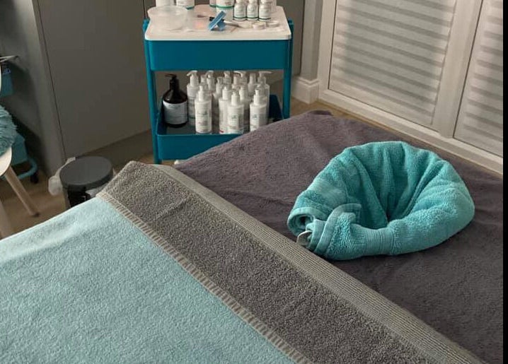 Relaxing treatment room at Glamour and Glitter by Stef, Portchester, England, GB, showcasing plush towels.