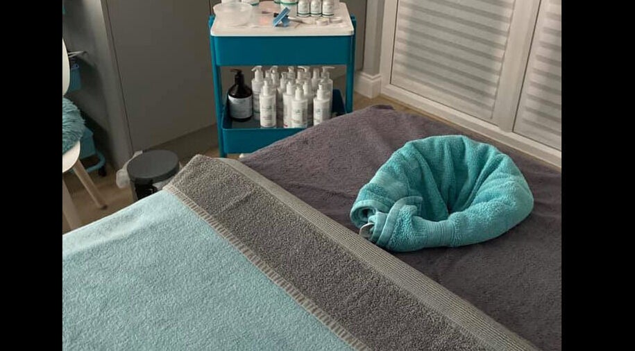 Relaxing treatment room at Glamour and Glitter by Stef, Portchester, England, GB, showcasing plush towels.