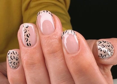 Elegant leopard print nail art at Roots Hair & Co, Needham Market, England, GB.