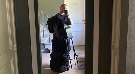 Individual with bags at Studio Tinka by Tine Josephy, Gent, Vlaams Gewest, BE capturing a mirror selfie.