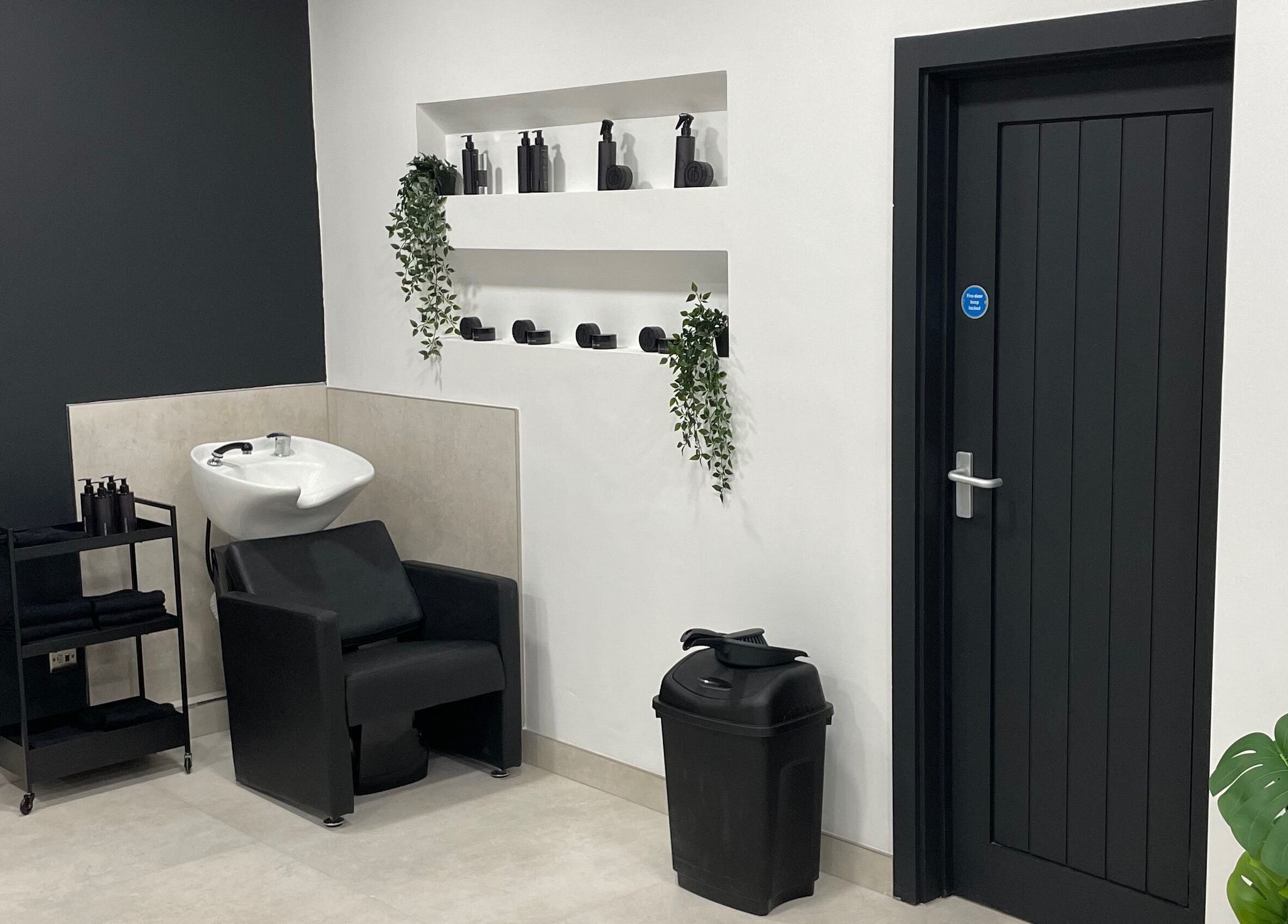 Modern salon wash station at Club Twenty Two, Cardiff, Wales, GB with elegant design and sleek decor.