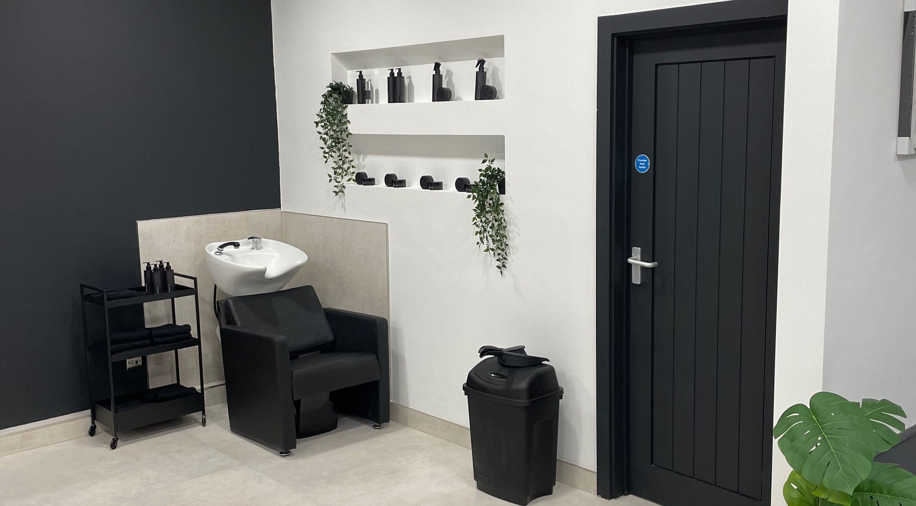 Modern salon wash station at Club Twenty Two, Cardiff, Wales, GB with elegant design and sleek decor.