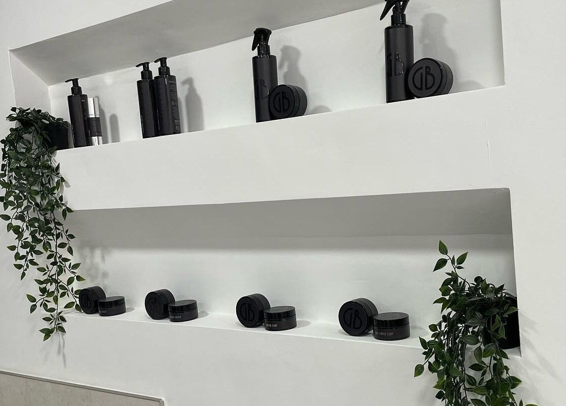 Chic product shelf with greenery at Club Twenty Two, Cardiff, Wales, GB.