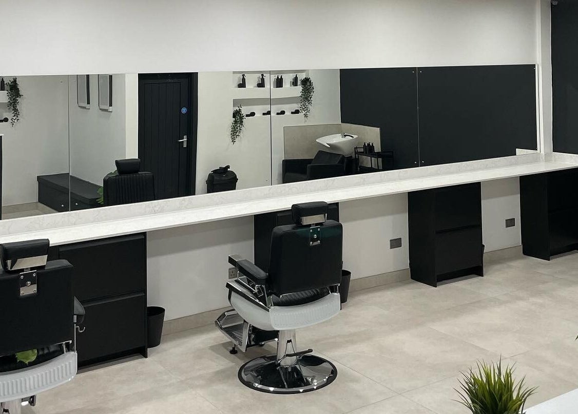 Chic barber chairs and modern decor at Club Twenty Two, Cardiff, Wales, GB.