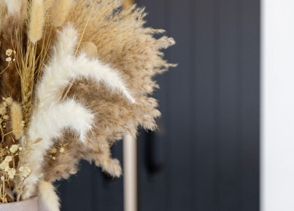 Dried floral arrangement at Edge Hairdressing, Tamborine Mountain, QLD, AU accentuates the salon’s refined decor.