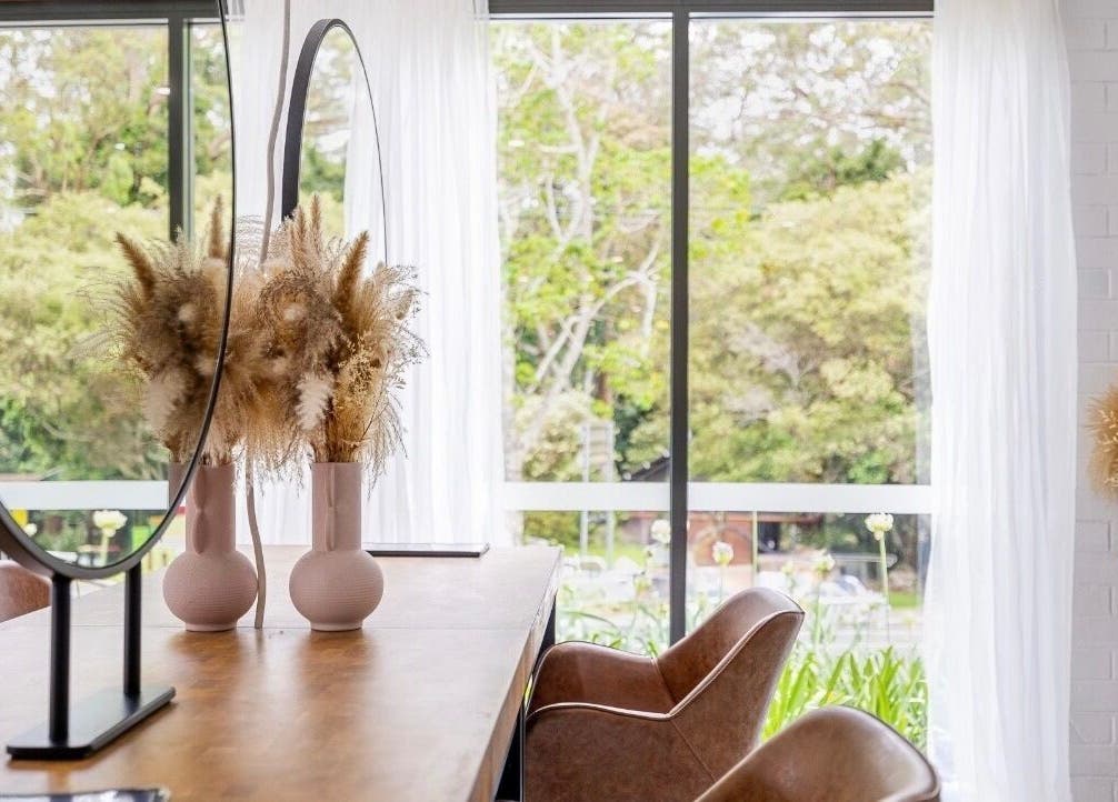 Chic interior of Edge Hairdressing in Tamborine Mountain, QLD, AU with stylish decor and light-filled space.