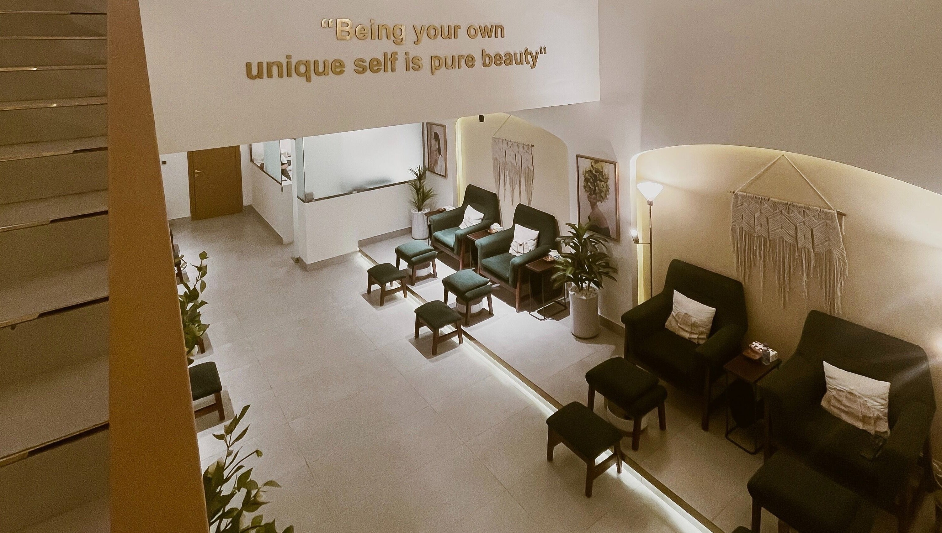 Inviting lounge at The Unique White Salon, Riyadh, Riyadh Province, SA with plush seating and elegant decor.