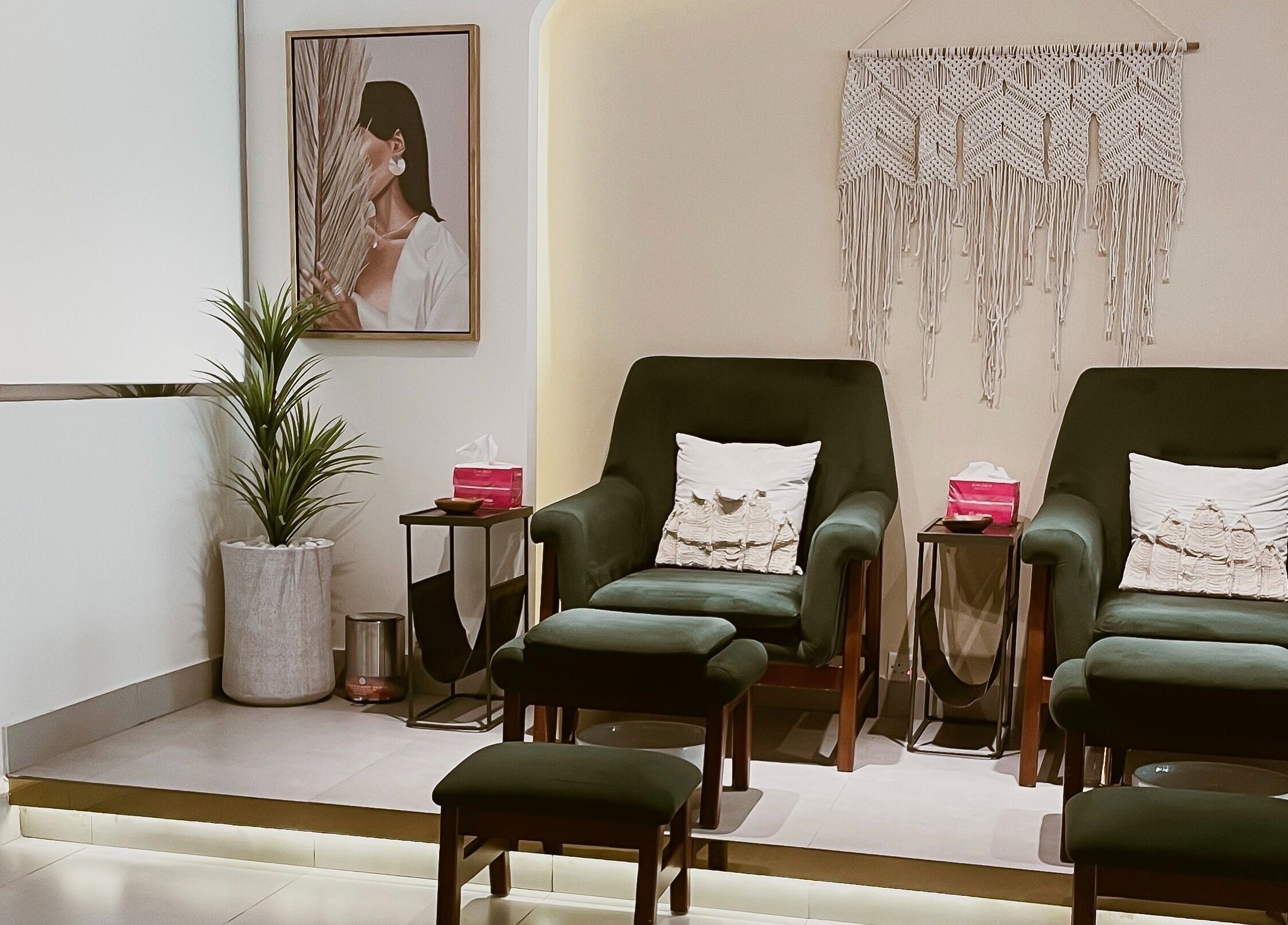Relaxing lounge setup at The Unique White Salon, Riyadh, Riyadh Province, SA, with elegant armchairs and decor.