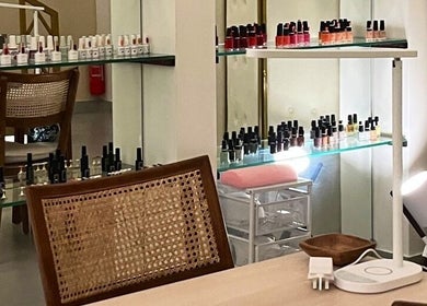 Nail polish display at The Unique White Salon, Riyadh, Riyadh Province, SA, showcasing vibrant color variety.