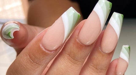 Stylish green and white nail art manicure at Sculpted, Cape Town, Western Cape, ZA.