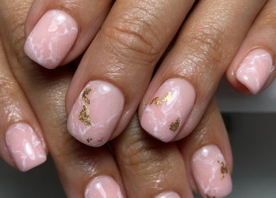 Elegant pink and gold marble nails at Sculpted, Cape Town, Western Cape, ZA, showcasing expert nail art design.