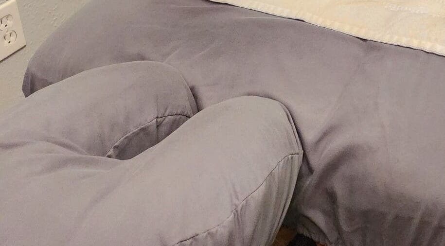 Massage table at Jai Thai Massage, Mesa, Arizona, US, with plush padding for client comfort.