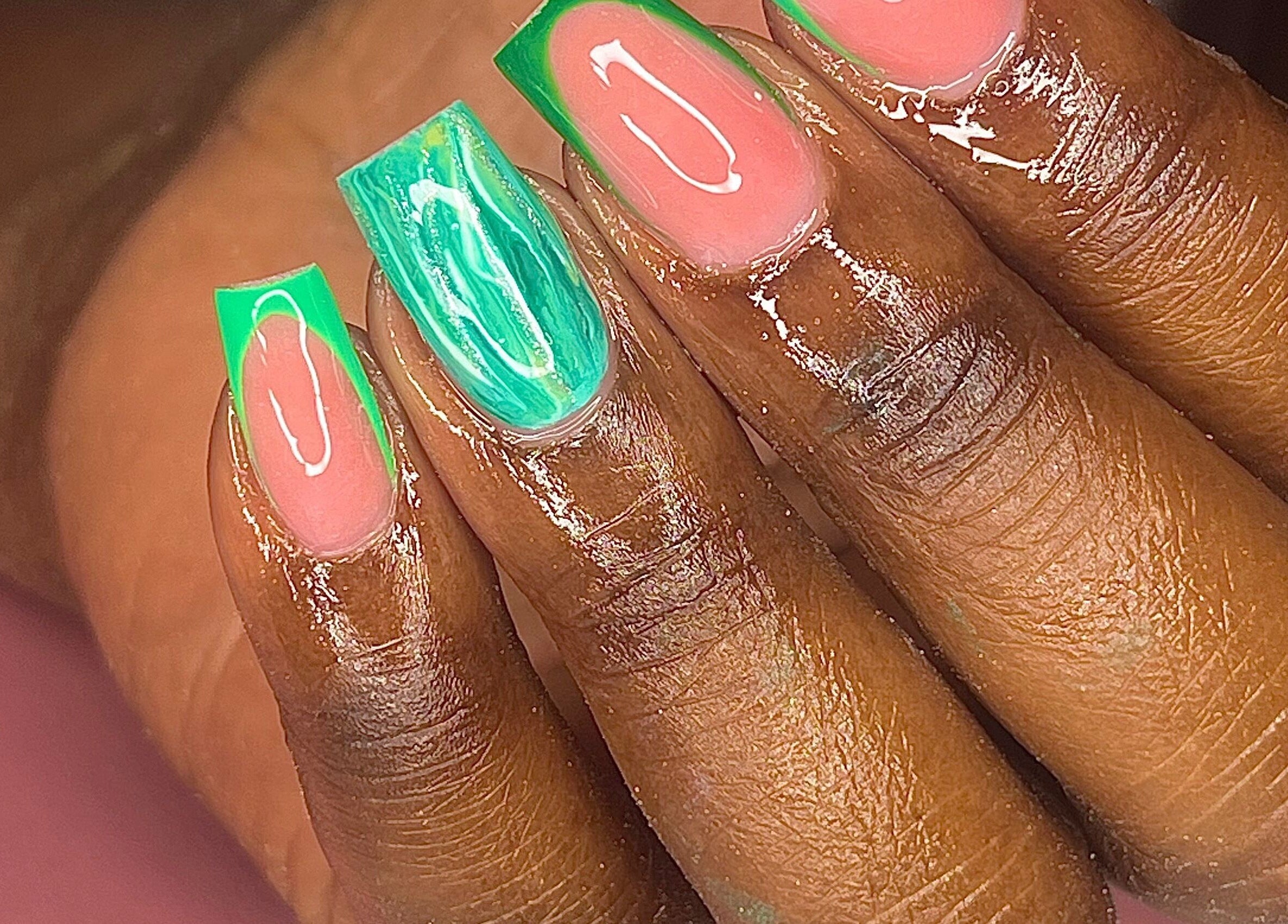 Vibrant green nail art from The Vanity Project, Mount Standfast, Saint James, BB, showcasing artistic flair.