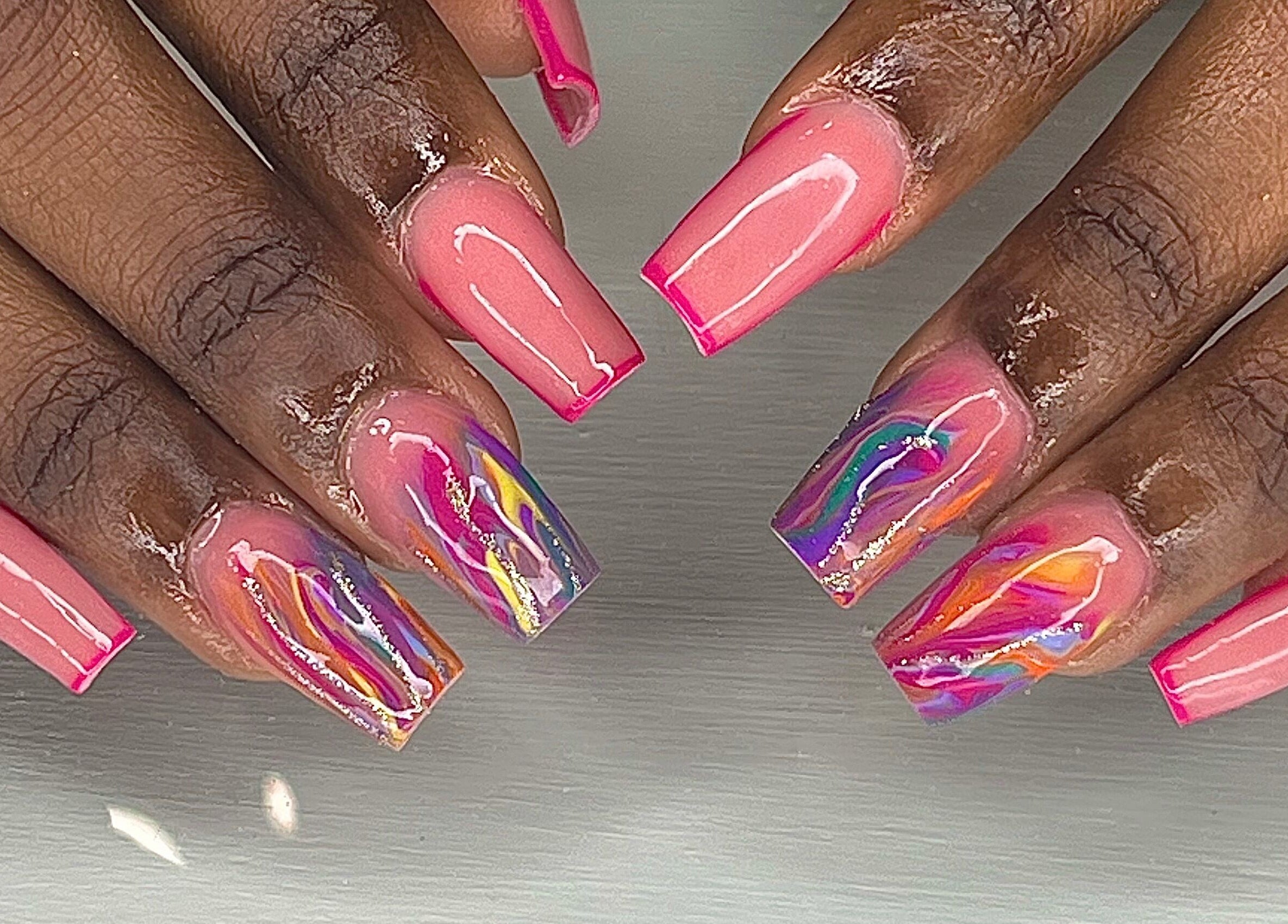 Colorful nail art at The Vanity Project, Mount Standfast, Saint James, BB, showcasing vibrant designs.