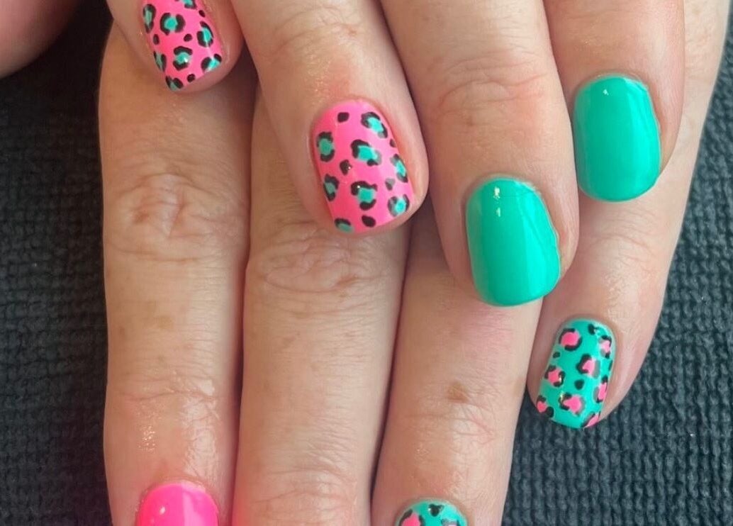 Stylish leopard print nails in pink and green by Nails by Ella, Waterlooville, England, GB.