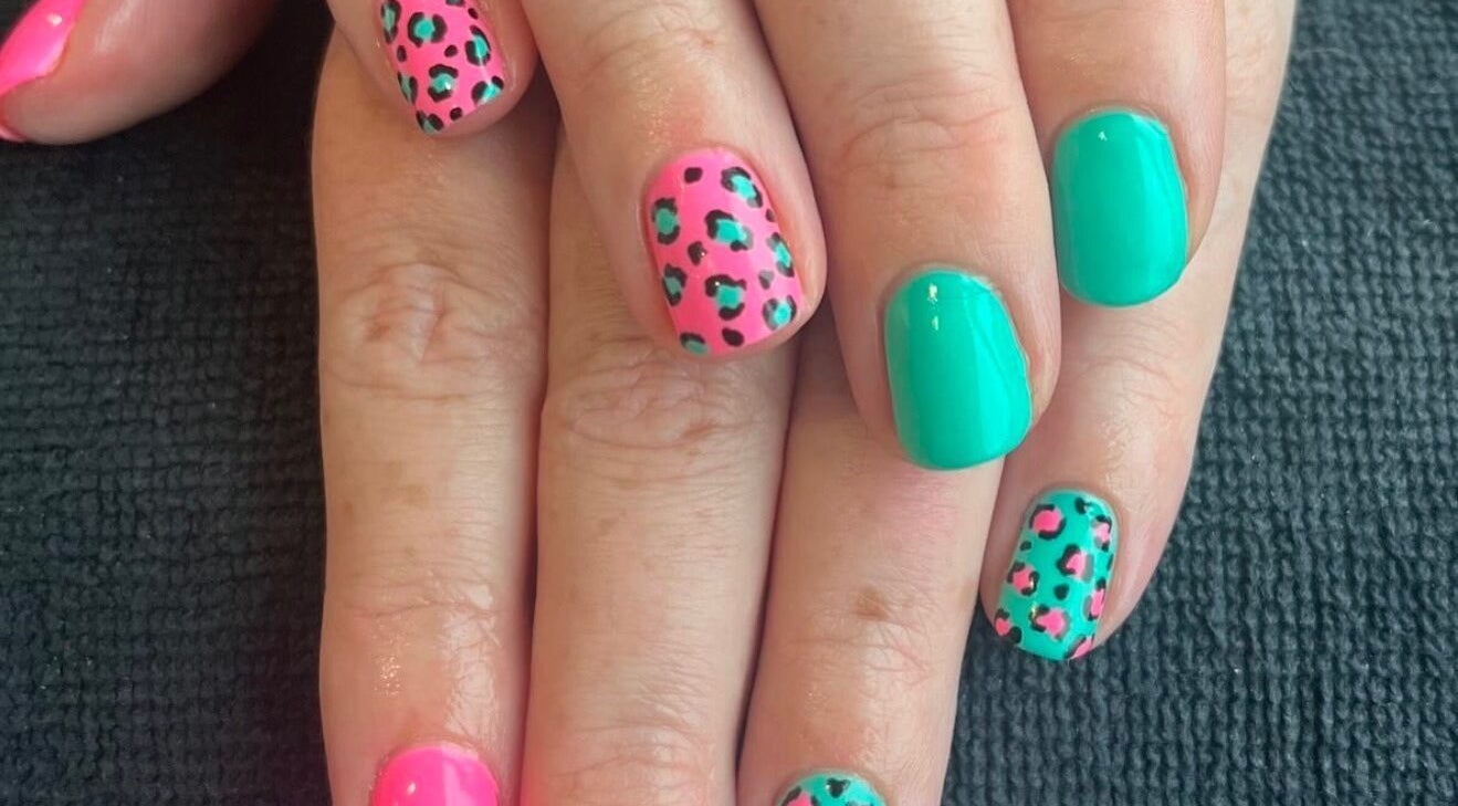 Stylish leopard print nails in pink and green by Nails by Ella, Waterlooville, England, GB.