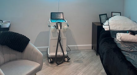 Sleek treatment room at Beleza Beauty & Clinic in Northampton, England, GB showcasing advanced equipment and serene setup.
