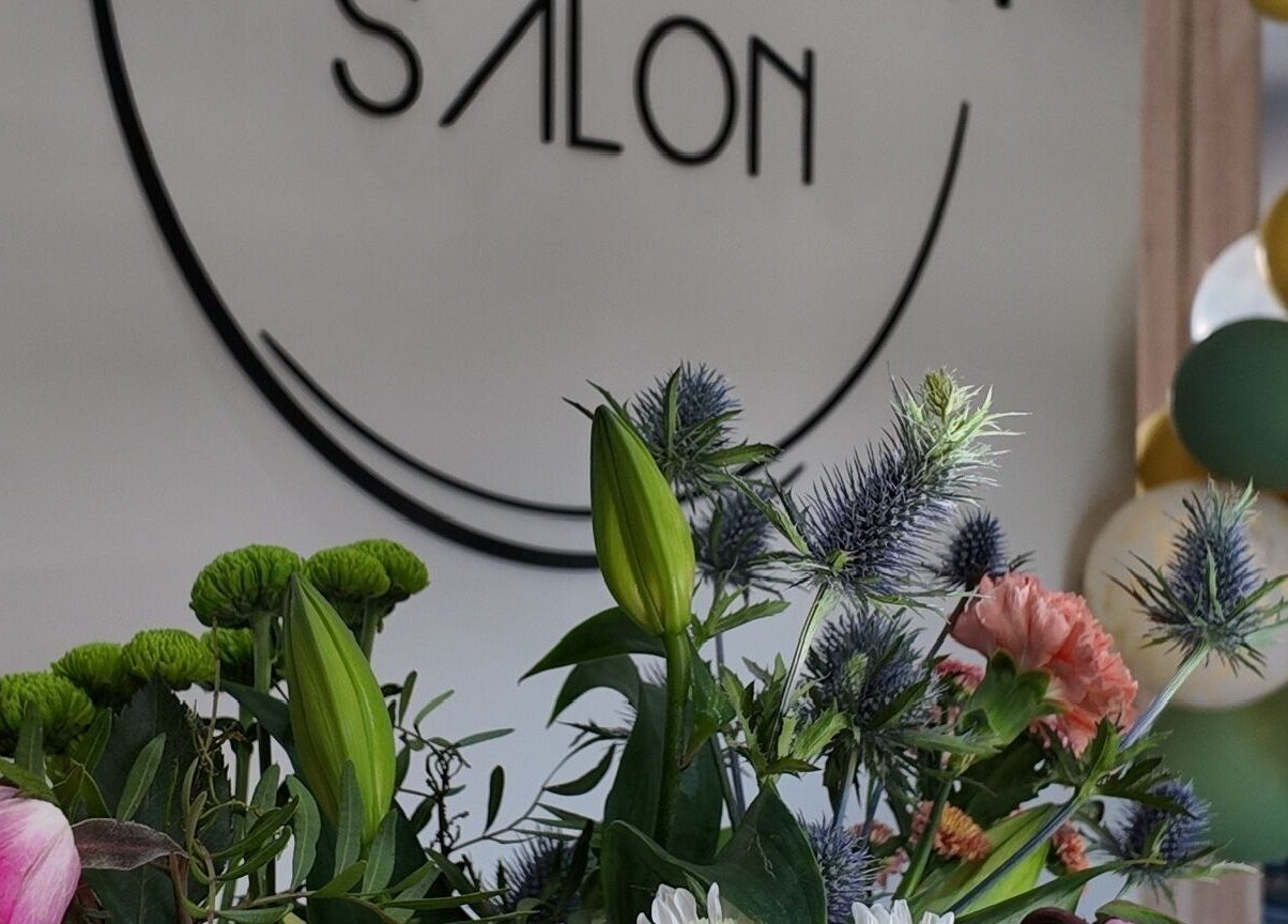 Elegant floral arrangement at Evolved Salon, Boroughbridge, England, GB, enhancing the welcoming ambiance.