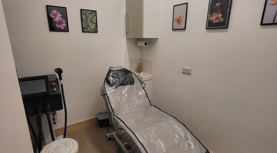 Luxury treatment room at CK Laser at Salon Forty Four, Eastbourne, England, GB, featuring modern equipment.
