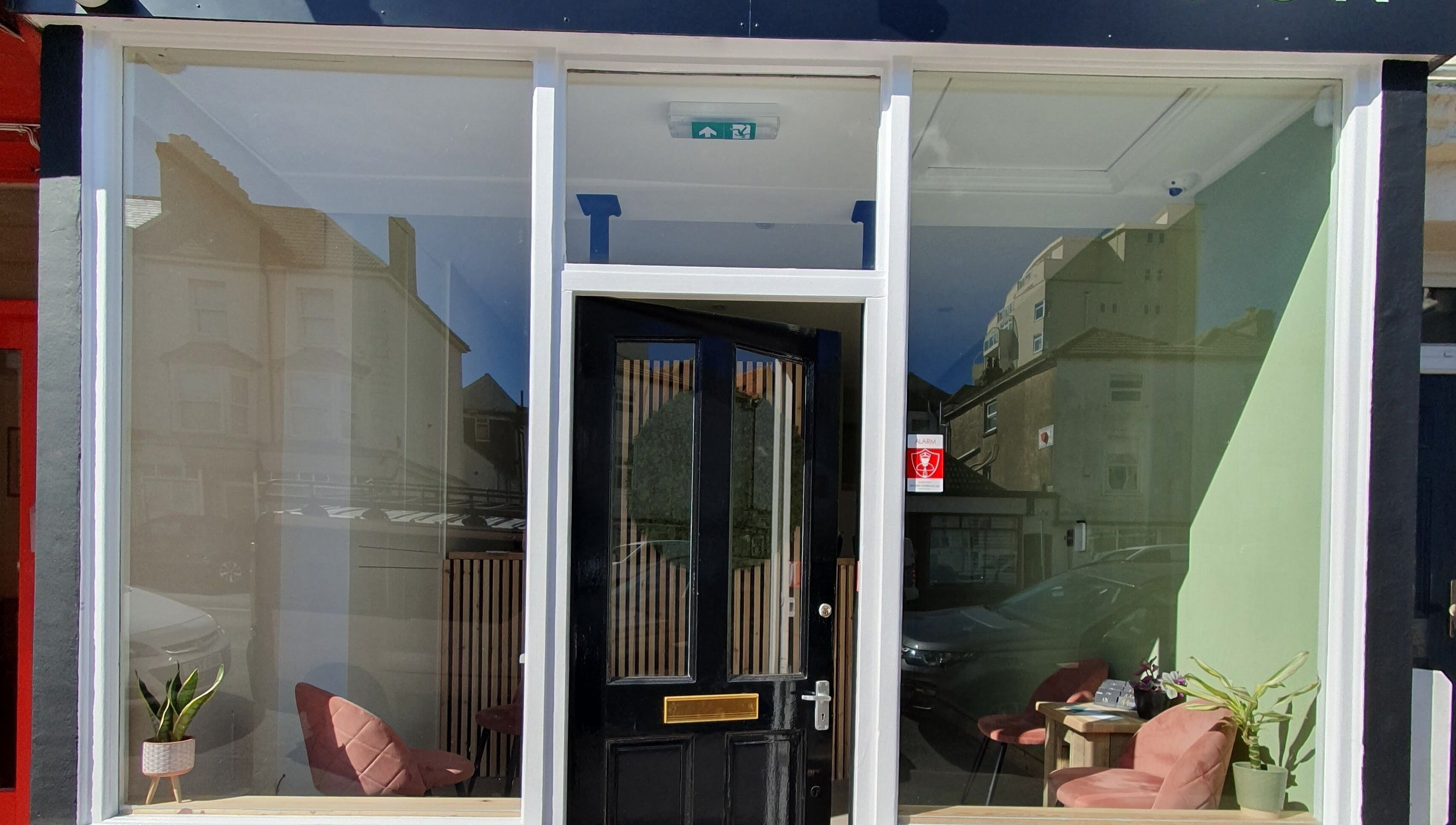 Front view of Salon Forty Four | Laser | Nails in Eastbourne, England, GB with modern glass facade.