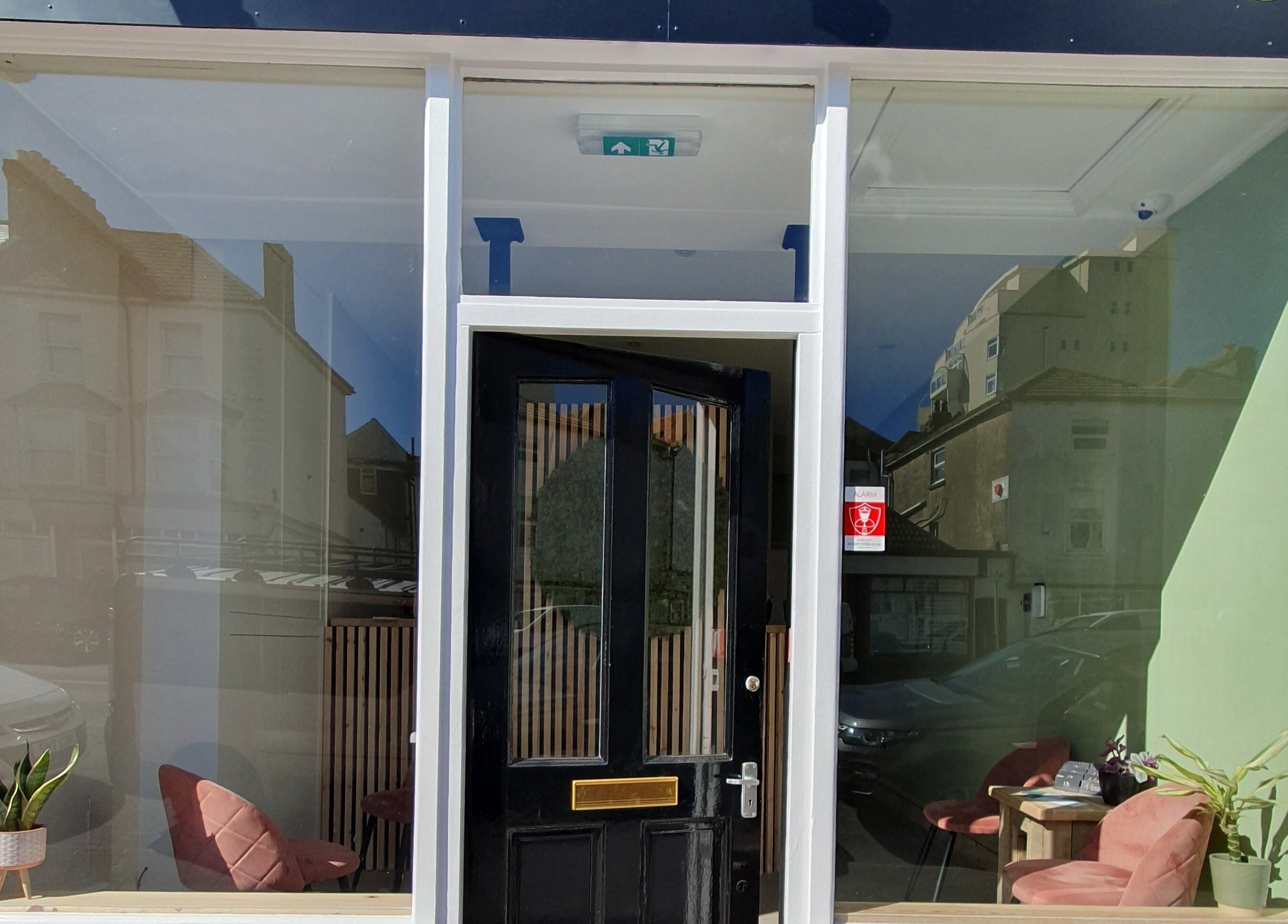 Front view of Salon Forty Four | Laser | Nails in Eastbourne, England, GB with modern glass facade.