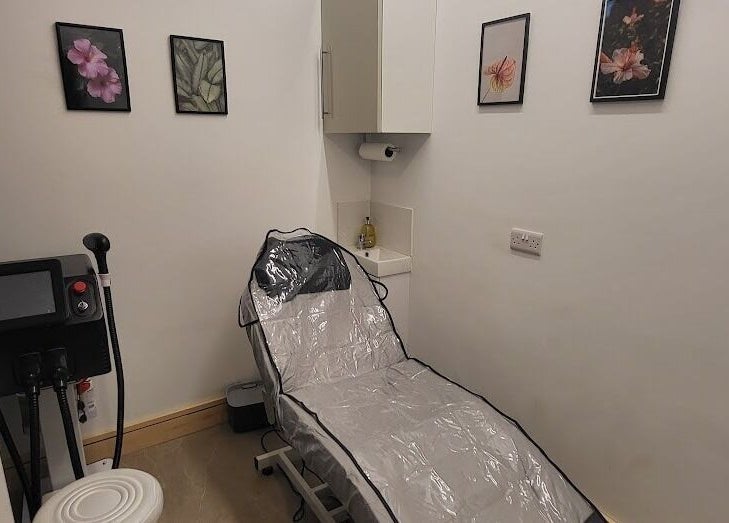 Salon Forty Four | Cozy laser treatment room in Eastbourne, England, GB with modern décor and equipment.