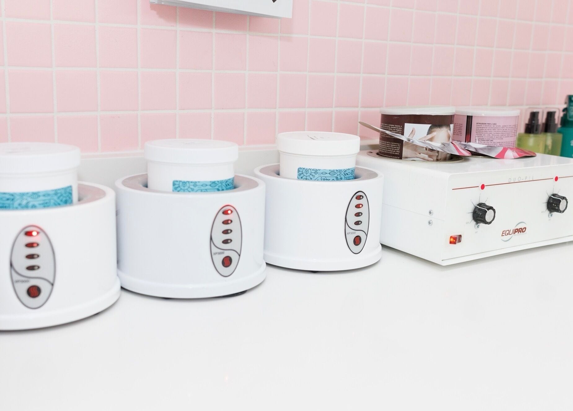 Professional wax warmers at Sugr Sugr Wax Bar, Ottawa, Ontario, CA, ready for premium waxing services.