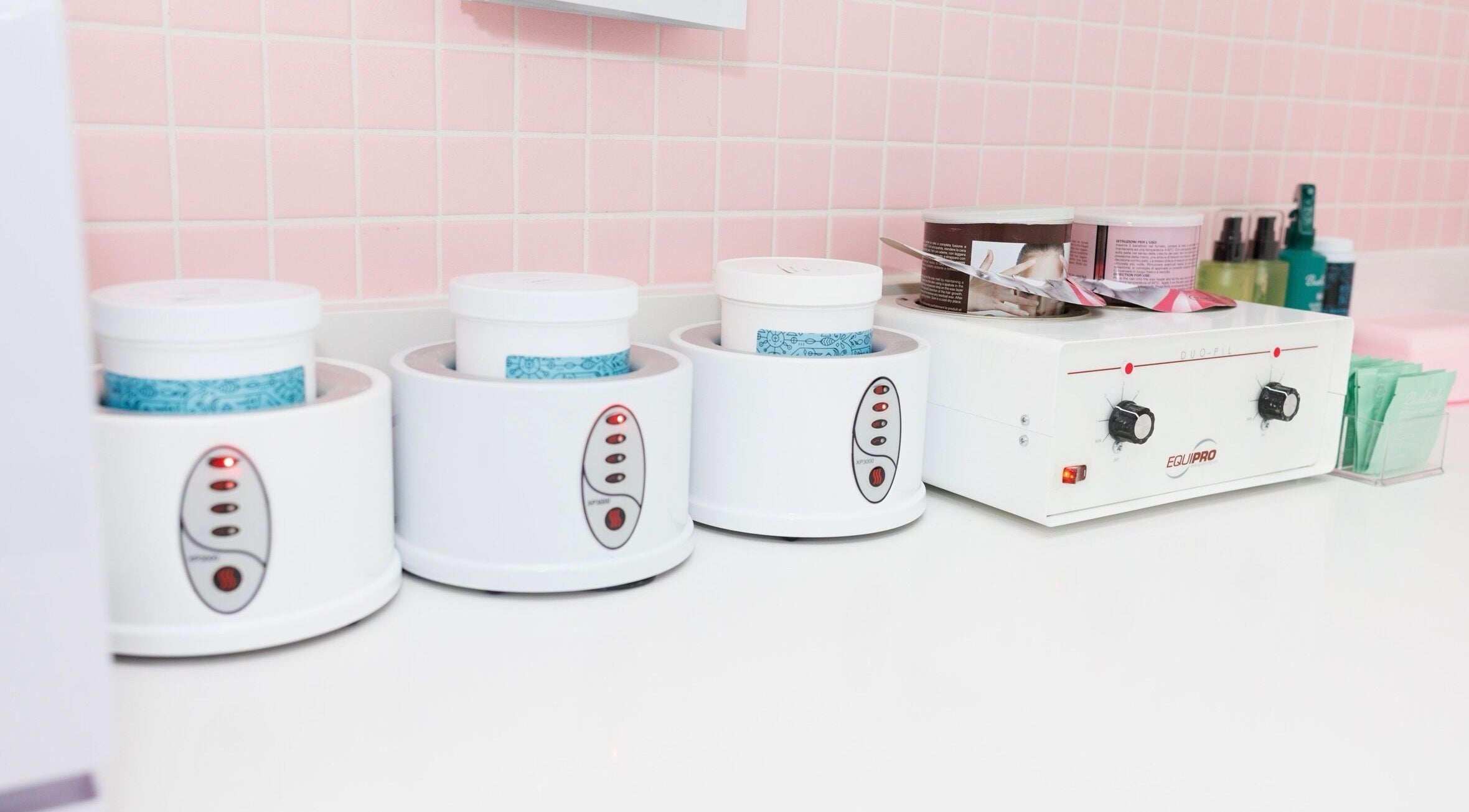 Professional wax warmers at Sugr Sugr Wax Bar, Ottawa, Ontario, CA, ready for premium waxing services.