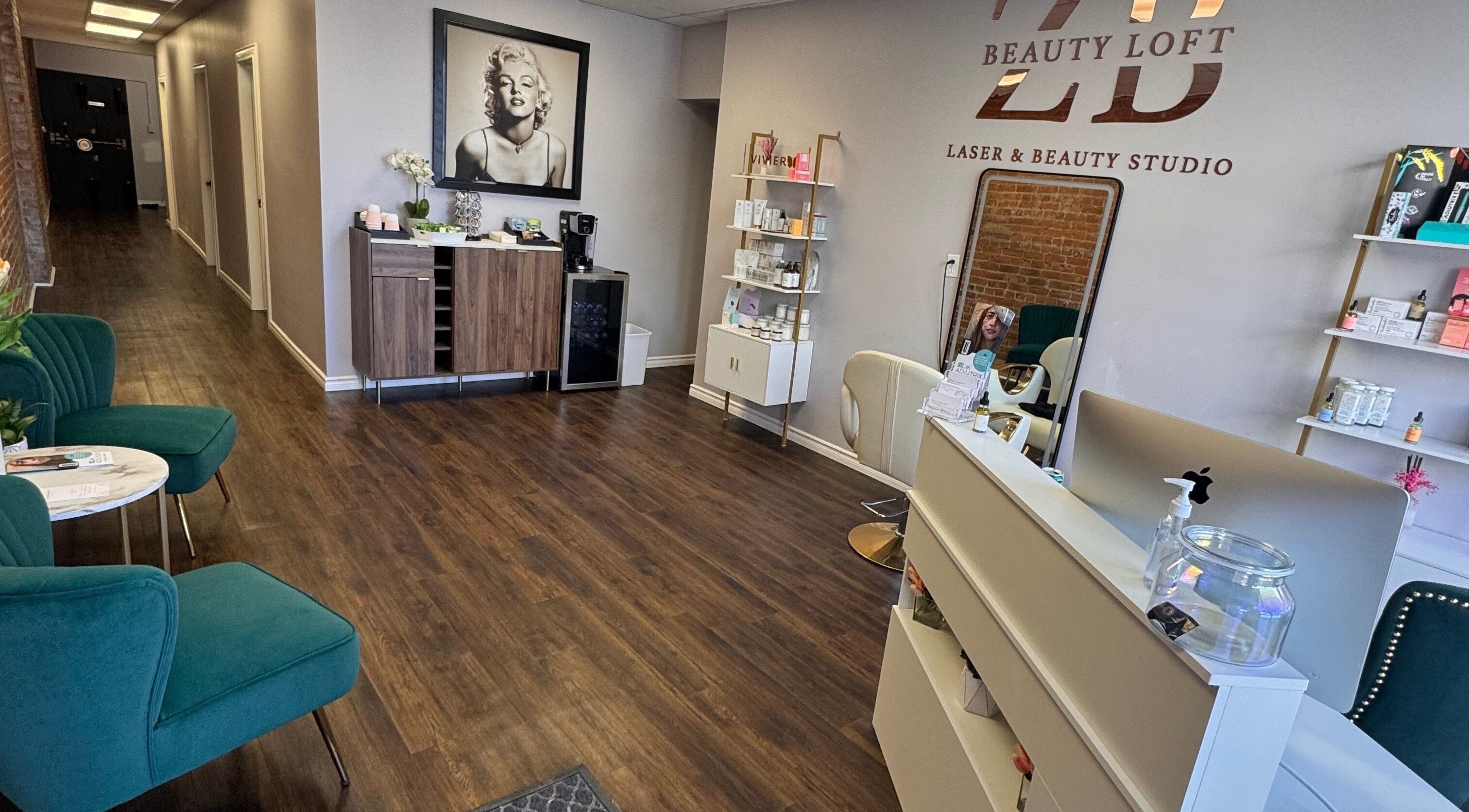 Elegant interior of ZB Beauty Loft Laser & Beauty Studio, Pembroke, Ontario, CA, showcasing modern decor and seating.