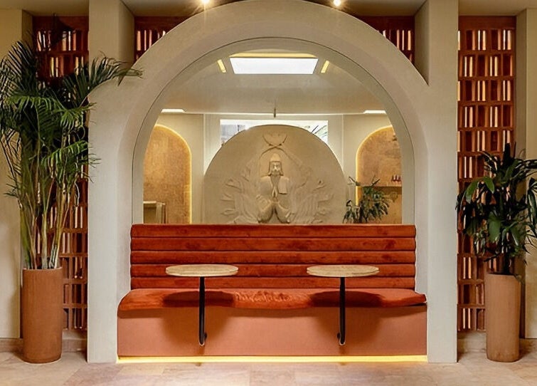 Elegant archway and seating area at Asai Spa, Bali, Bali, ID, inviting relaxation and serenity.