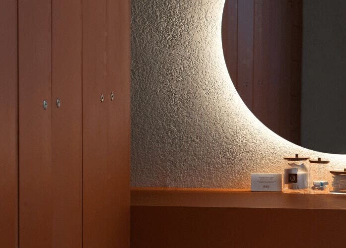 Elegant locker room at Asai Spa, Bali, Bali, ID with modern lighting and soothing ambiance.