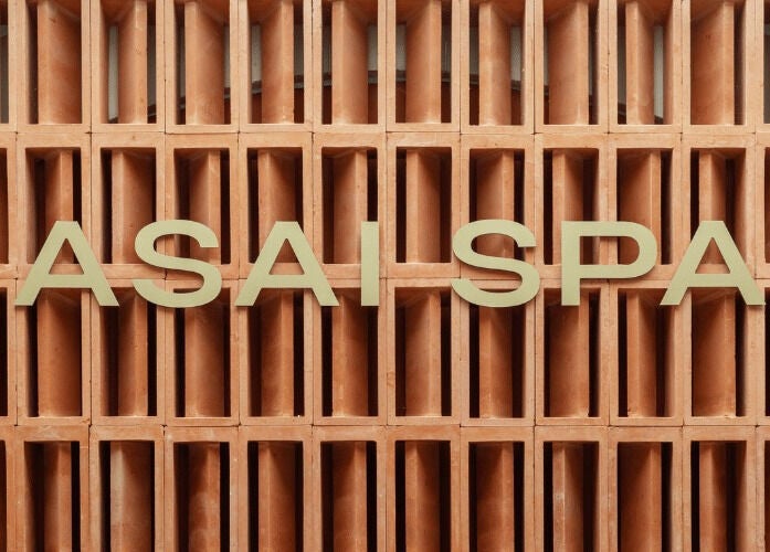 Elegant Asai Spa sign set against a warm, textured backdrop in Bali, Bali, ID.
