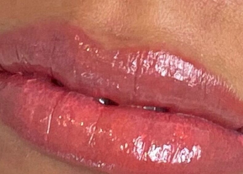 Glossy lips at Defined Elegance, Durban North, Kwazulu-natal, ZA. Highlighting expert lip care and beauty services.