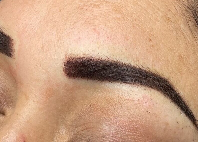Close-up of expertly shaped eyebrows at Defined Elegance, Durban North, Kwazulu-natal, ZA.