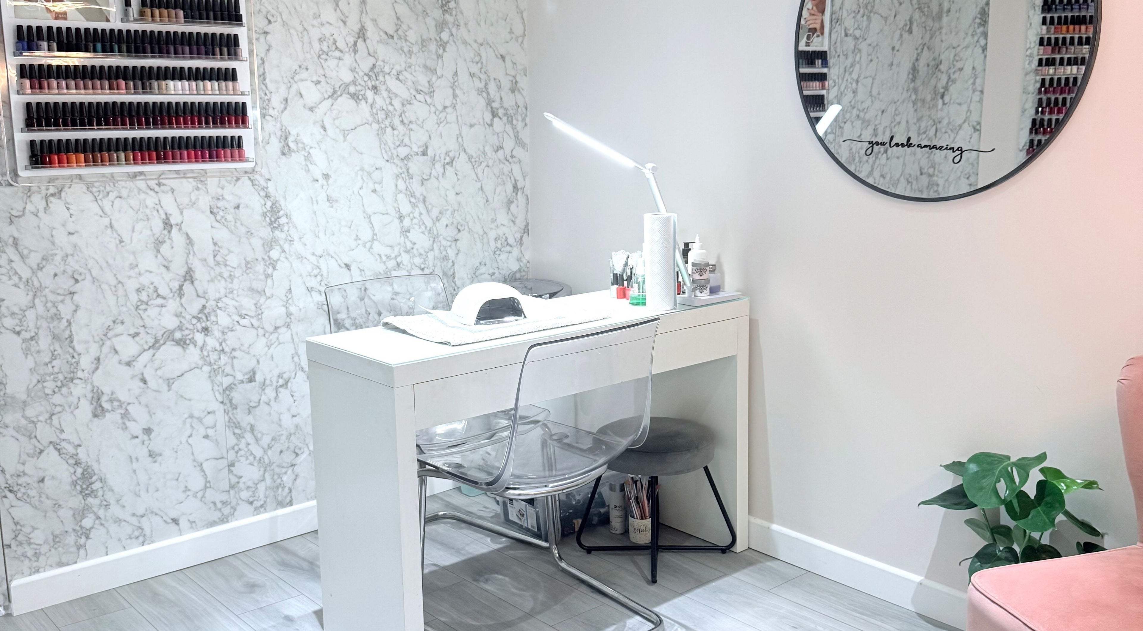 Sophisticated nail station at Ashley Blakemore Beauty & PMU, Cheadle, England, GB with modern decor.