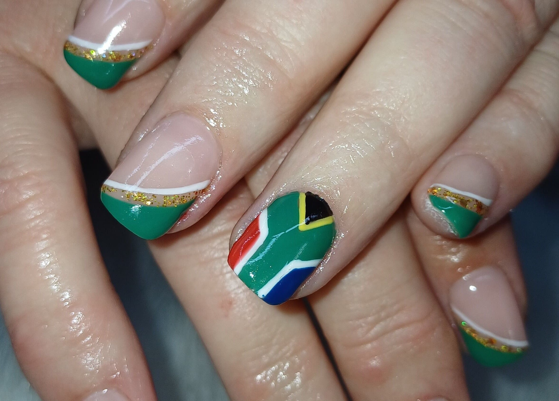 Stylish nail art with South African flag design at Nails by Meegs, Edenvale, Gauteng, ZA.