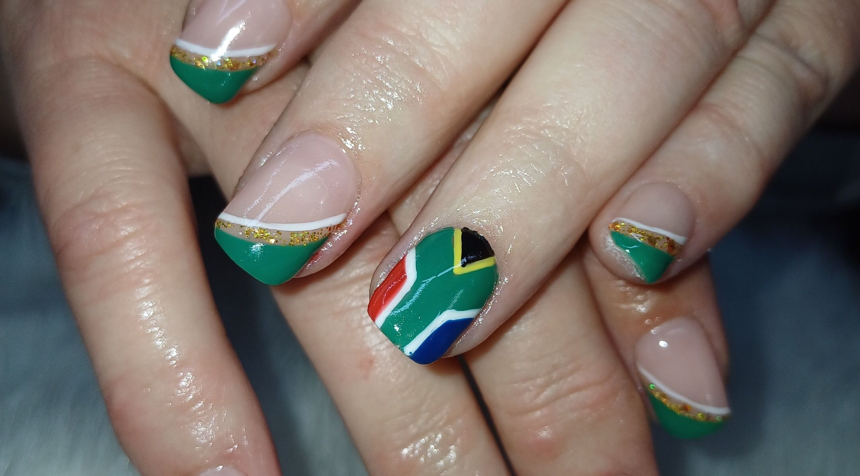 Stylish nail art with South African flag design at Nails by Meegs, Edenvale, Gauteng, ZA.
