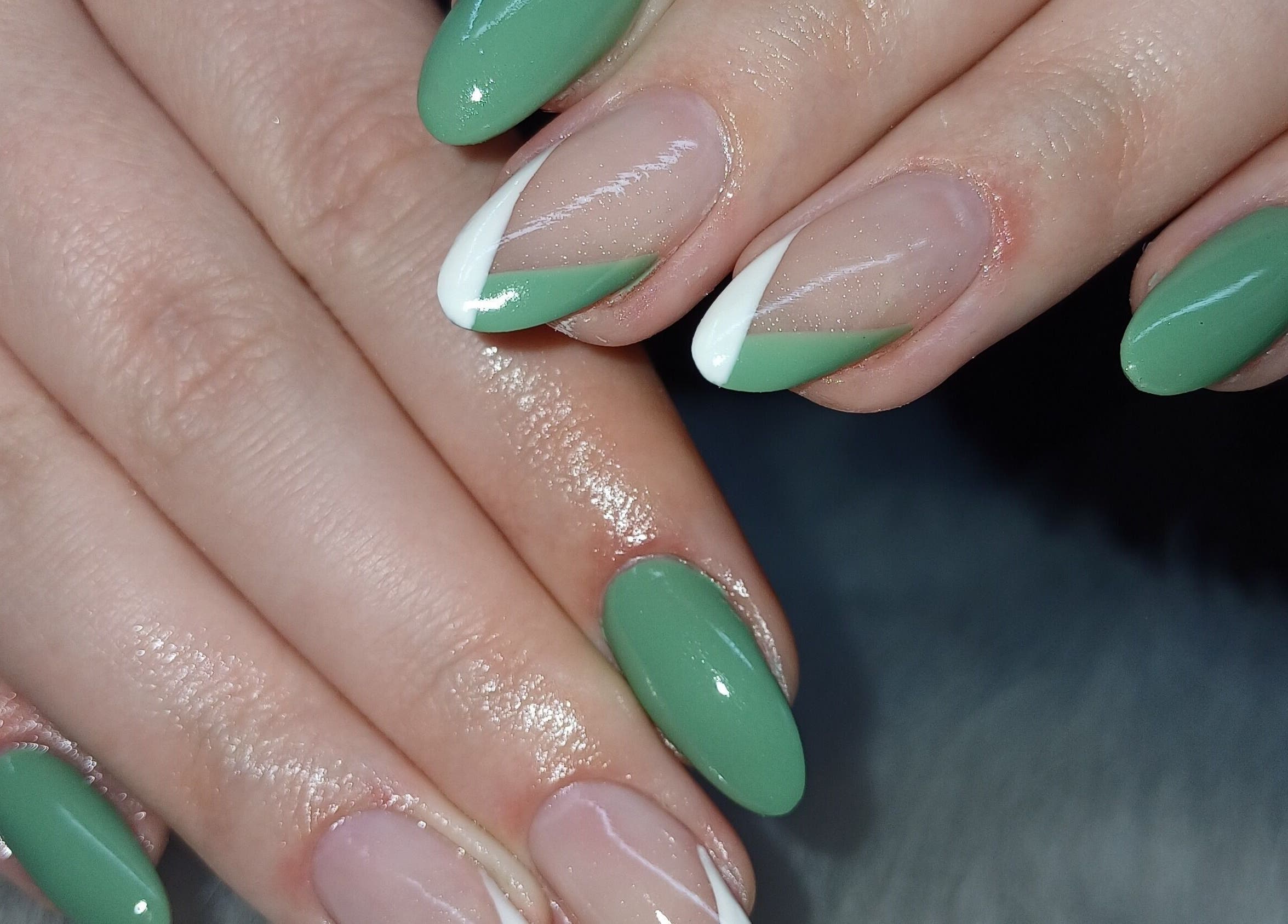 Elegant green manicure design at Nails by Meegs, Edenvale, Gauteng, ZA. Perfect blend of style and color.