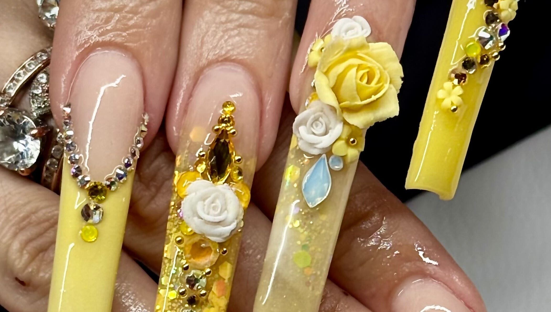Detailed floral nail art at Artistry Lash Brows & Nails Studio, Twin Falls, Idaho, US.