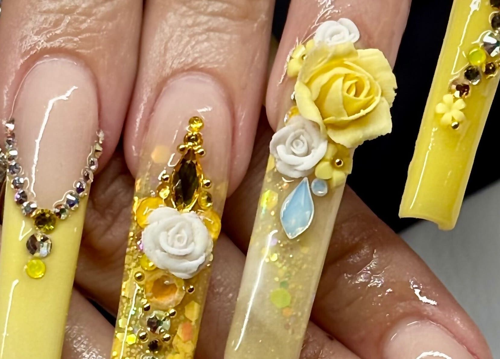 Detailed floral nail art at Artistry Lash Brows & Nails Studio, Twin Falls, Idaho, US.