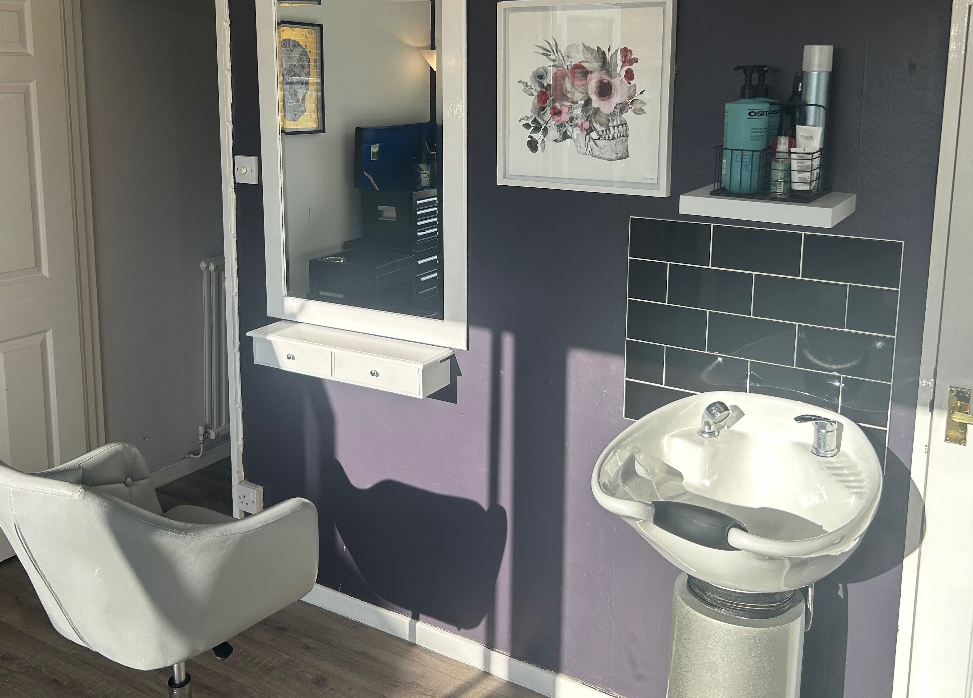 Stylish hairdressing station at Five One Four, Littlehampton, England, GB with modern decor and equipment.