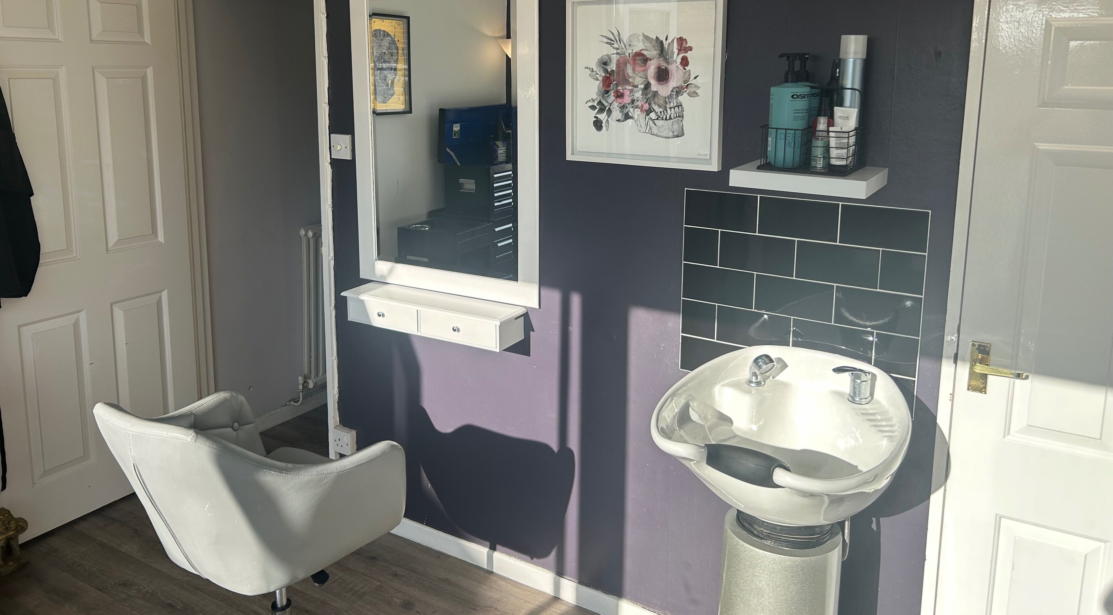 Stylish hairdressing station at Five One Four, Littlehampton, England, GB with modern decor and equipment.