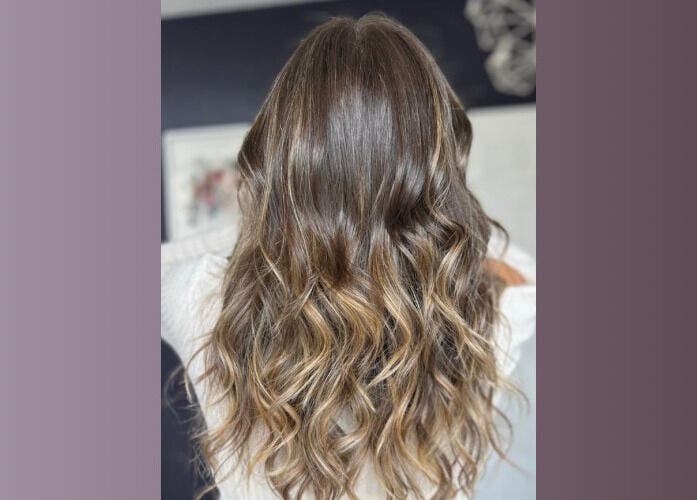 Stylish wavy hairstyle at Five One Four, Littlehampton, England, GB.