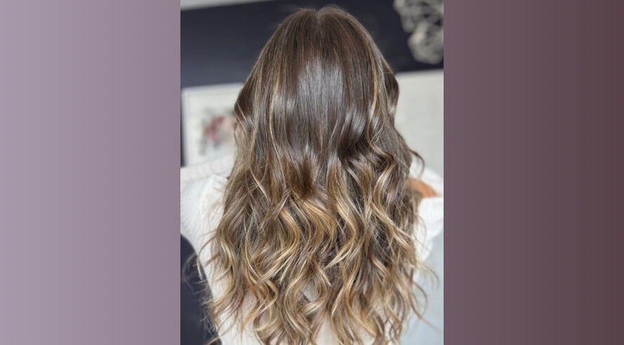 Stylish wavy hairstyle at Five One Four, Littlehampton, England, GB.