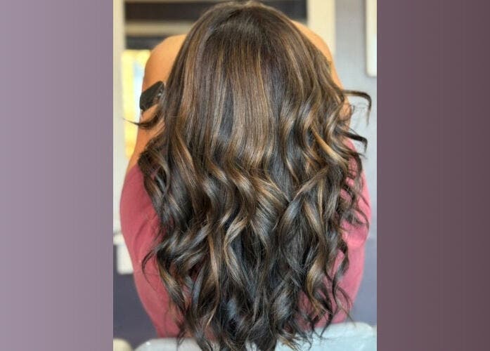 Elegant wavy hairstyle showcased at Five One Four, Littlehampton, England, GB.